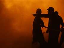 عامل يشعل النيران في منزل جاره بسبب حافظة نقود مفقودة بسوهاج